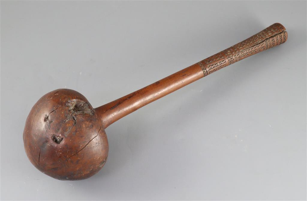 A 19th century Fijian Ula throwing club, length 15.75in. diameter 4.25in.